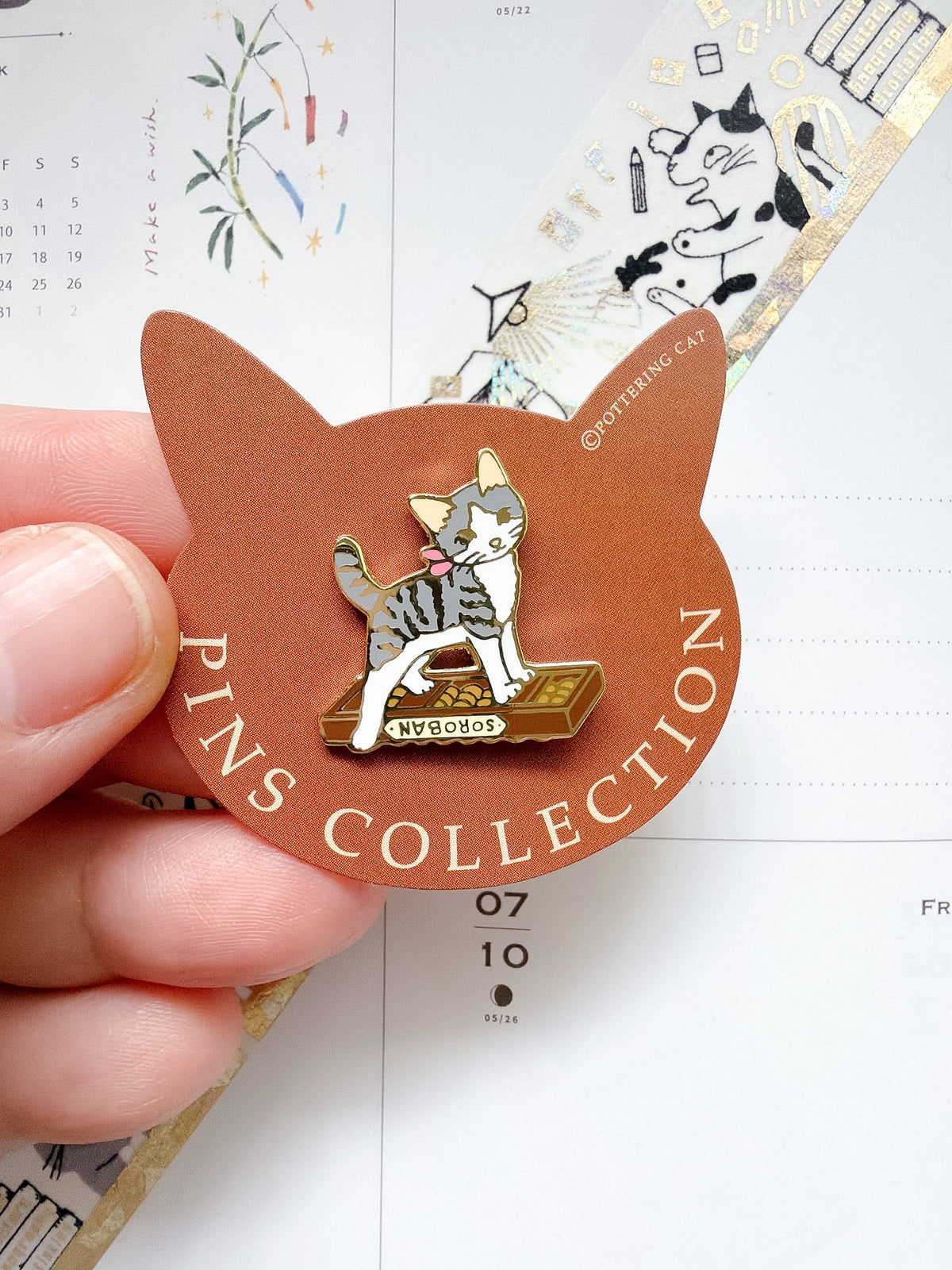 Pottering Cat | Abacus Scratcher Enamel Pin | PZ-041