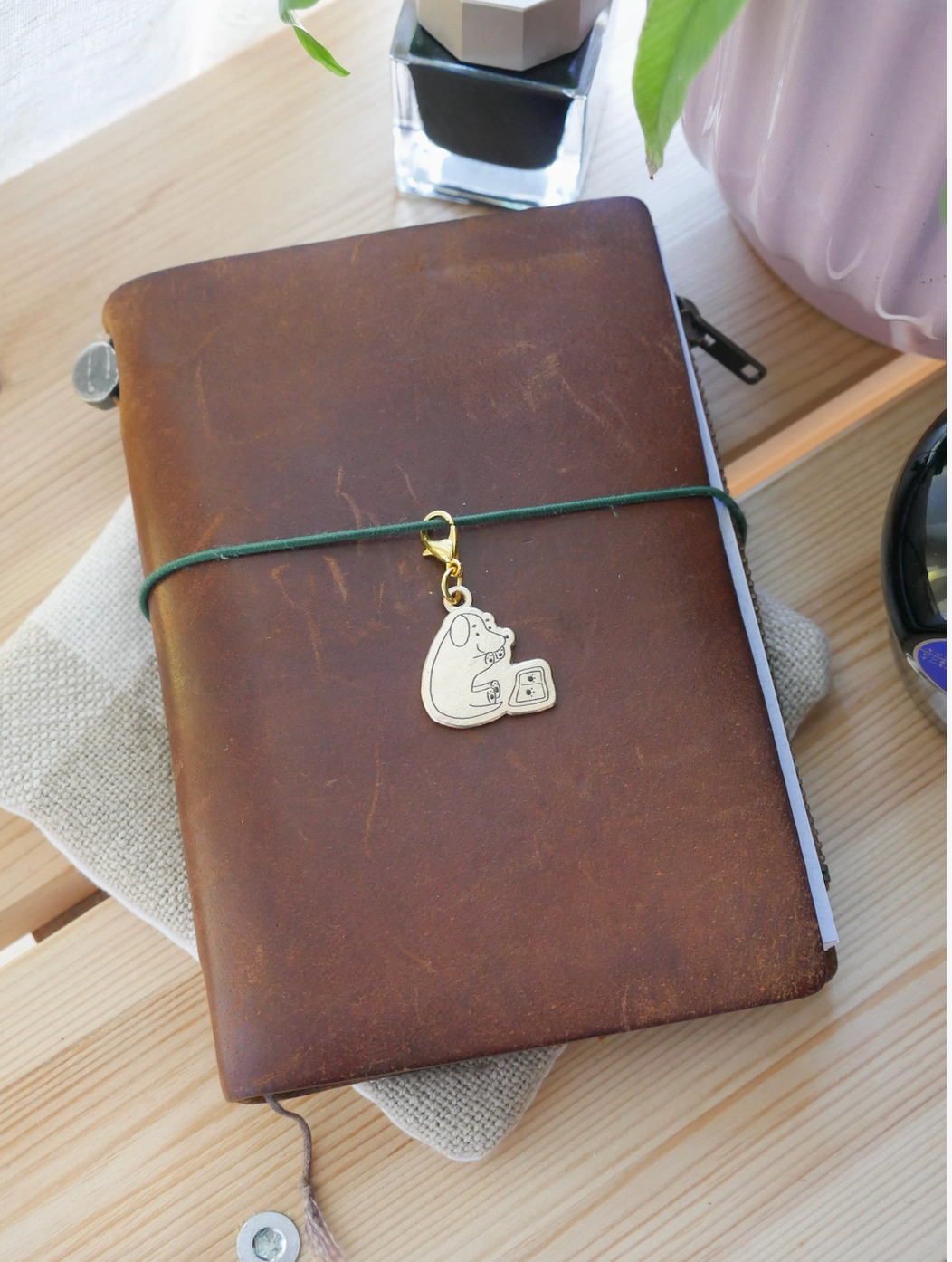 Dana ate Oatmeal | Paw Print Brass Charm